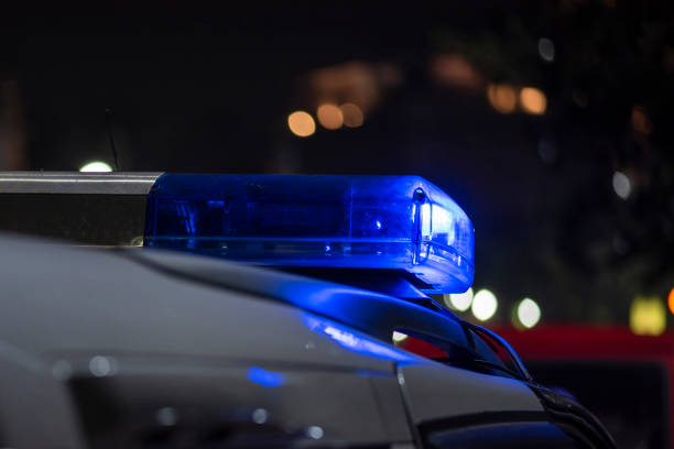 istock Police car on street 1422813055
