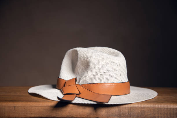 istock Woman hat on a wooden background 1422814562
