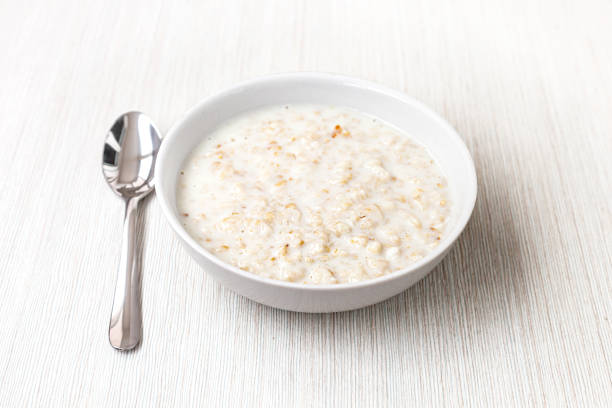 istock oatmeal in milk - light background 1422814712