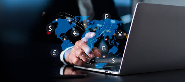 Currency exchange, money transfer, FinTech financial technology, global company, internet banking, interbank payment idea, man utilizing laptop computer with foreign currencies Currency exchange, money transfer, FinTech financial technology, global company, internet banking, interbank payment idea, man utilizing laptop computer with foreign currencies transfer rate stock pictures, royalty-free photos & images