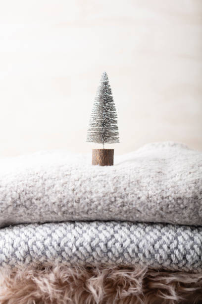 istock Christmas little trees and golden lights bokeh. 1422818309