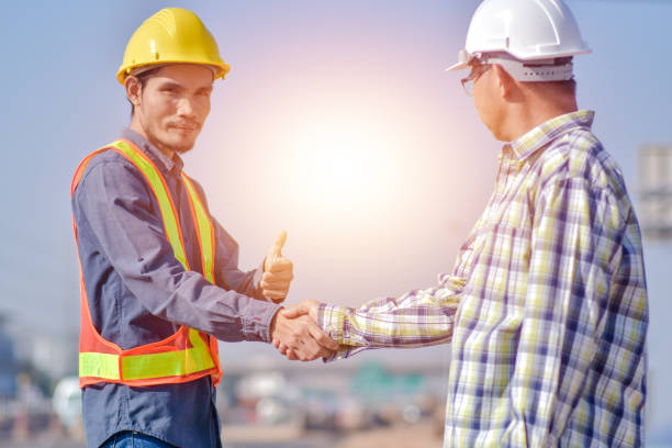 istock Asian man construction safety suit helmet onsite work, Asian man Engineer 1422819643