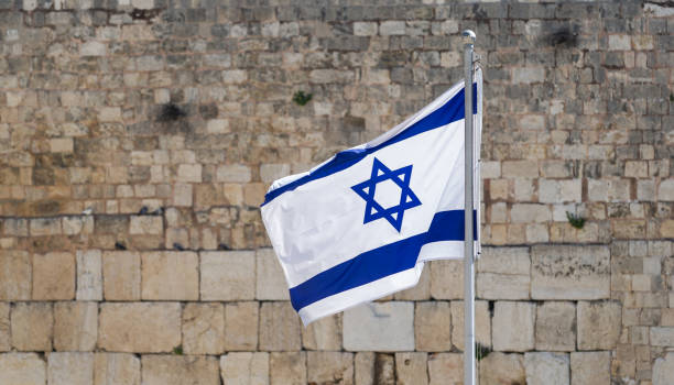 istock Israeli flag against the Wailing Wall in Jerusalem 1422823575