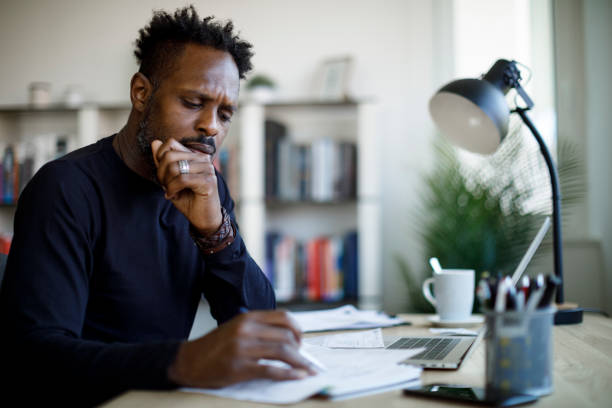 istock Worried man about budget and home finances 1422826980
