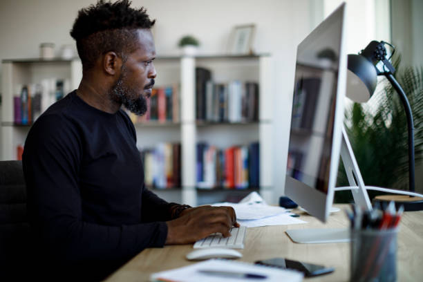 istock Worried man paying his utility bills online 1422827011