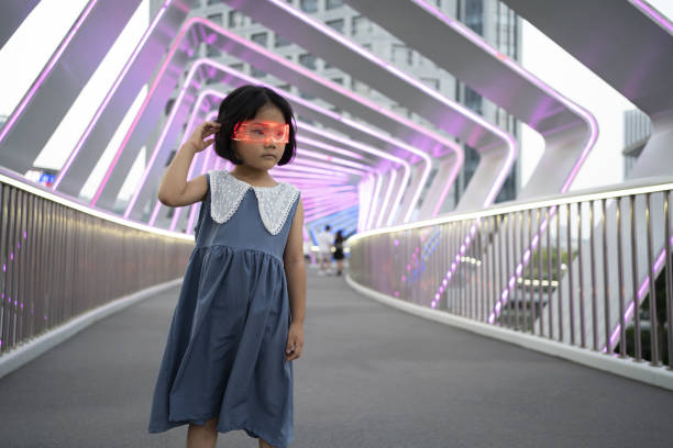 istock Virtual reality glowing glasses gaming experience for little girls 1422827111