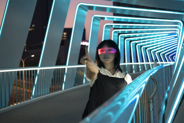 istock A woman glowing glasses gaming experience and virtual reality concept 1422827172