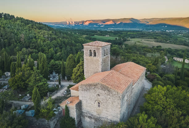 The Sainte-Foy de Mirmande Chapel is located in Mirmande, in the Drôme department in France. The Sainte-Foy de Mirmande Chapel is located in Mirmande, in the Drôme department in France. drome stock pictures, royalty-free photos & images