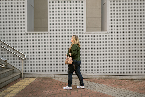 Woman on the way in the financial district