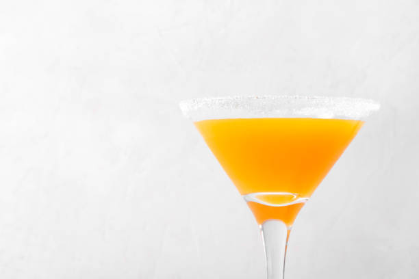 istock Yellow alcoholic cocktail with fruit juice 1422833848