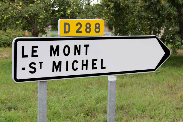 arrow with the inscription LE MONT ST MICHEL place where there is the island of the famous abbey in France arrow with the inscription LE MONT ST MICHEL place where there is the island of the famous abbey in Normandy in northern France fleche stock pictures, royalty-free photos & images