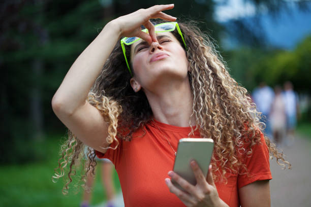 istock Young woman having a headache 1422835525