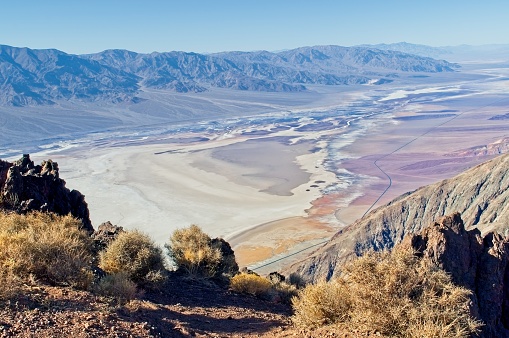 Bad water basin in Death Valley national park, the lowest elevation in North America. At 282 feet below sea level another world landscape can be found. An elevated view of the stark but colorful landscape.