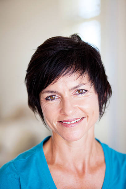 istock elegant middle aged woman 142284184