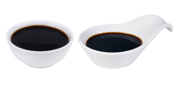 istock Soy sauce in a white bowl on an isolated white background. 1422843500
