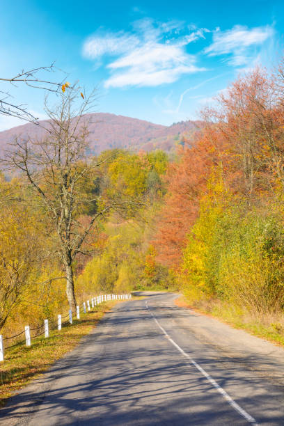 istock old mountain road in autumn 1422848033