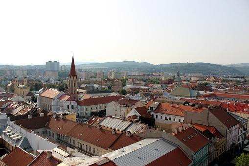 Panoramic view of Kosice Old city from St. Elisabeth Cathedral, scenic daytime cityscape with streets, red tiled roofs of medieval buildings and blue cloudy sky, urban skyline, Slovakia (Slovensko)