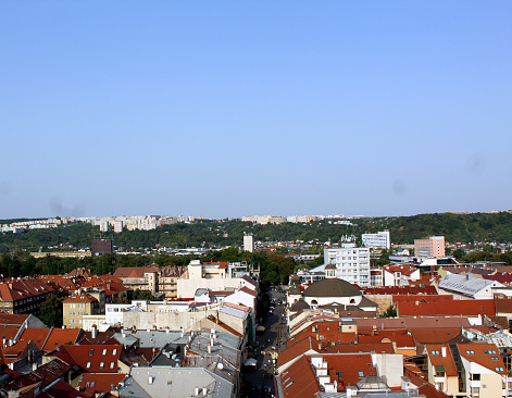 Panoramic view of Kosice Old city from St. Elisabeth Cathedral, scenic daytime cityscape with streets, red tiled roofs of medieval buildings and blue cloudy sky, urban skyline, Slovakia (Slovensko)