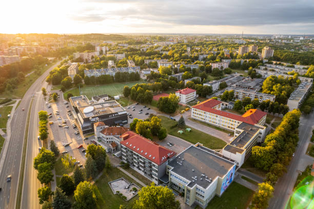 istock Green city from above at sunset - Stock Image 1422849077