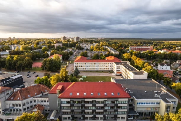 istock Green city from above at sunset - Stock Image 1422849095