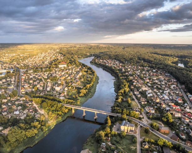 istock Green city from above at sunset - Stock Image 1422849103