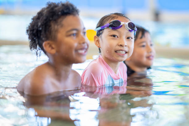 istock Children During a Swimming Lesson 1422849382