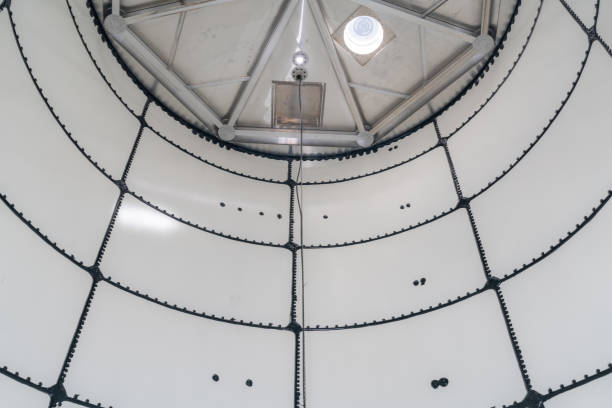 istock Image of a nondescript interior, inside, of an empty new above ground steel bulk water storage tank, confined space. 1422855207
