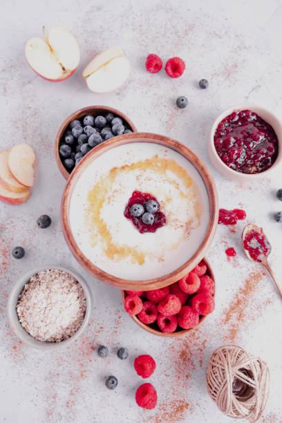 yogurt and berries - raspberry table wood autumn imagens e fotografias de stock