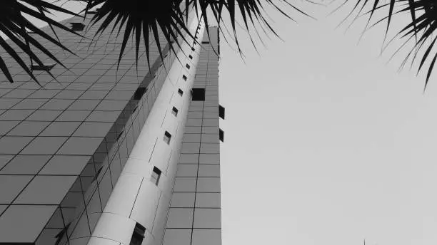 Black and white photo of modern building. Office building facade