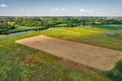 Drone aerial view over summer sunset river Ros landscape, Ukraine.