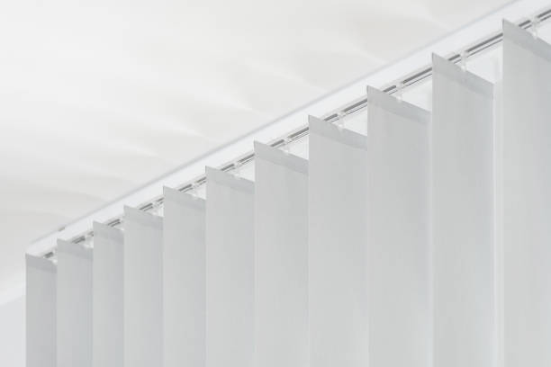 vertical and white fabric jalousie on headrail