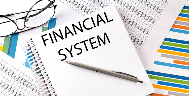 istock Notebook with text FINANCIAL SYSTEM . Diagram and white background,Business concept 1422871983