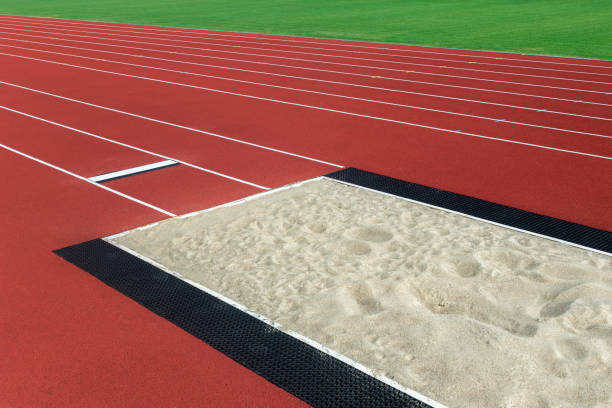 istock Long jump pit in Aa stadium. Horizontal sport theme poster, greeting cards, headers, website and app 1422873580