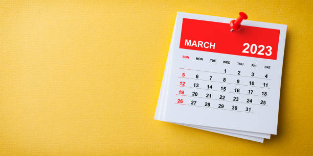 istock White Sticky Note With 2023 March Calendar And Red Push Pin On Blue Background 1422875113