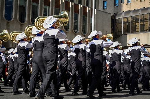 Calgary, Canada - July, 2019:  Fanfare band  featured in the (Calgary) Stampede Parade coming through downtown. The parade marks the start of the Calgary Stampede rodeo festival. Taken in July 2017.