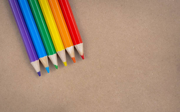 istock Colored pencils on a brown paper texture background. Copy space 1422882364