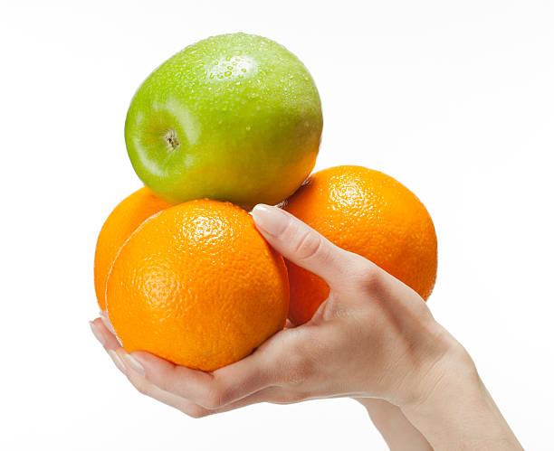 istock Human hands holding fresh fruits 142288781