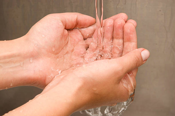istock Woman Washing Hands 142289249
