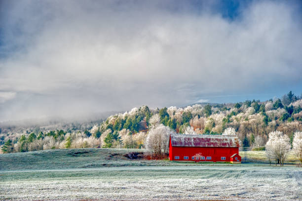 Old red barn on a cold New England morning