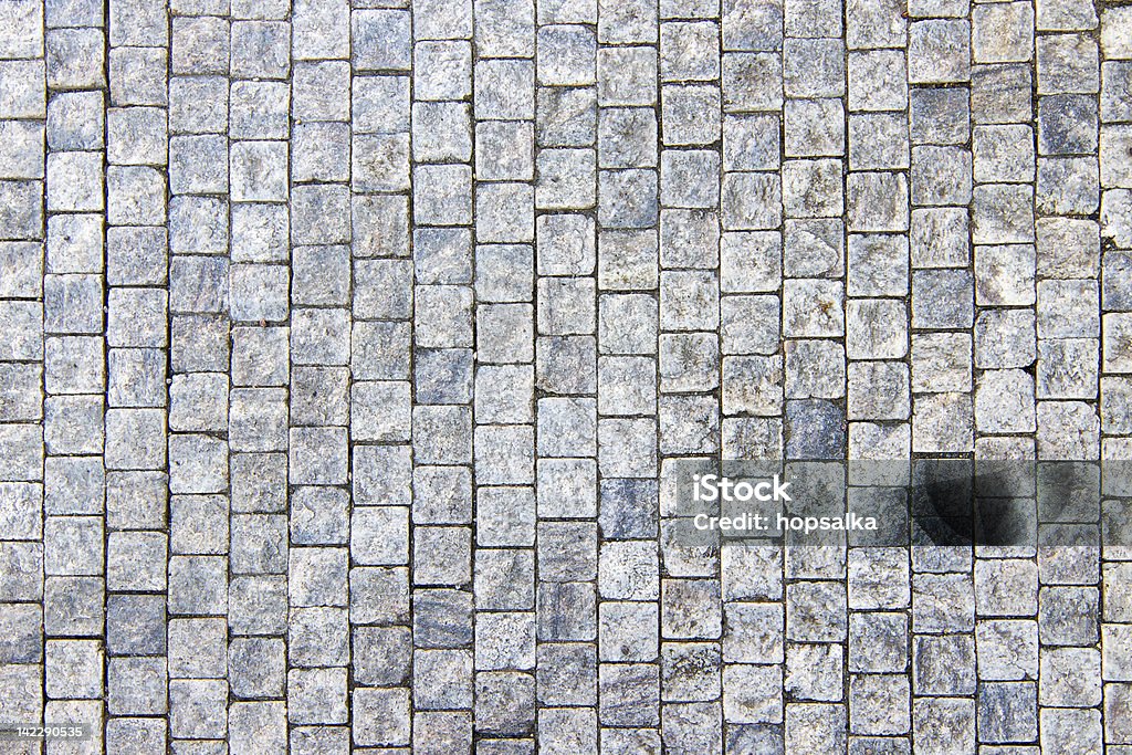 Granite cobblestoned pavement tle - Zbiór zdjęć royalty-free (Kamień polny)