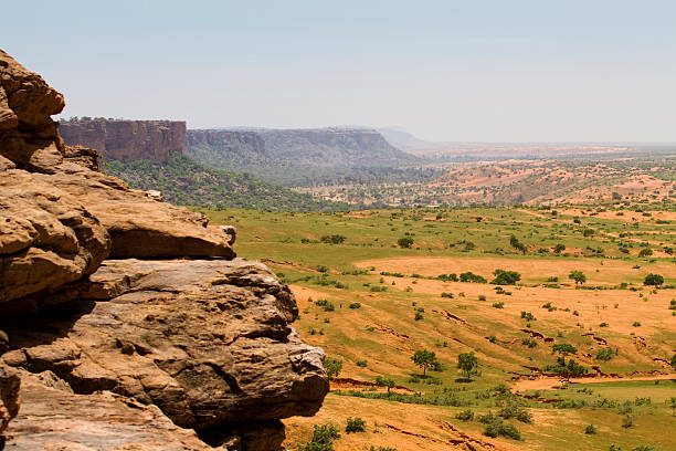 The Bandiagara Escarpment is an escarpment in the Dogon country of Mali. The Dogon are best known for their mythology, their mask dances, wooden sculpture and their architecture.