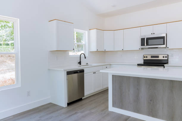 istock Installing kitchen appliances and kitchen cabinets in a new home 1422908091