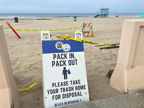 This sign,Informs people to enjoy the beach as well as keep it clean.