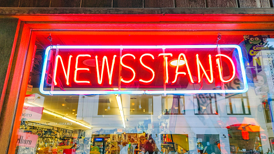 Newsstand sign on window in Lake Placid, NY on August 06/2022