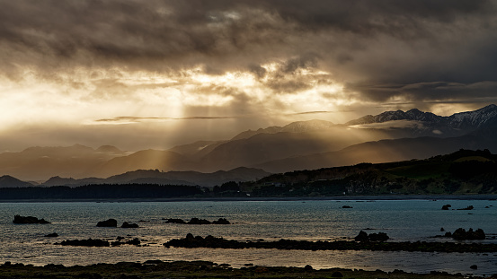 Looking west over Goose Bay at sunset, Kaikoura, south island, Aotearoa / New Zealand.