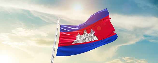 Cambodia national flag waving in beautiful sky.