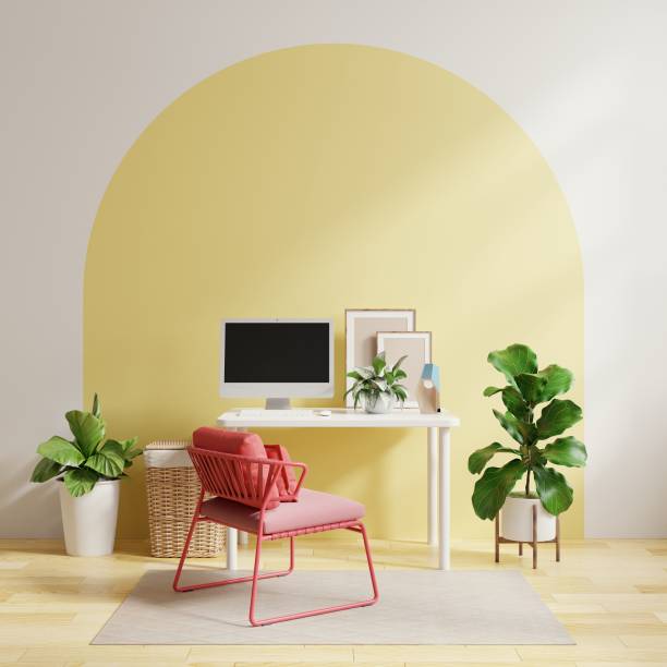 Office room with a two tone and pastel background.