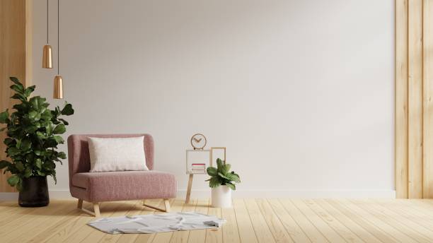 istock Modern minimalist interior with a pink armchair on empty white wall background. 1422948081