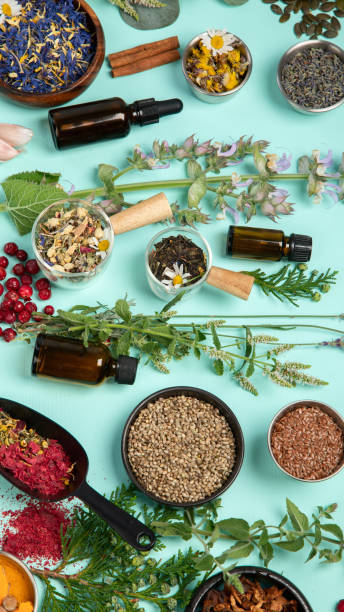 istock Alternative herbal medicine on green background. 1422948401