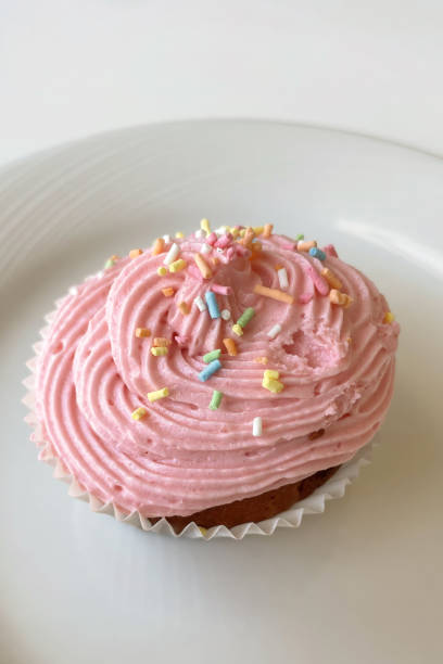 istock delicious ready-to-eat fruity cupcakes on plate 1422951401